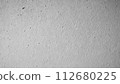 wall with uneven concrete surface 112680225