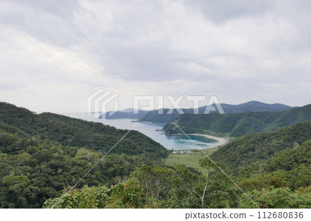 Amami Oshima is the largest island in the Satsunan island chain that runs between Kyushu and Okinawa and belongs to Kagoshima Prefecture. Amami Oshima is the largest island in the Satsunan island chain that runs between Kyushu and Okinawa and belongs to Kagoshima Prefecture. 112680836