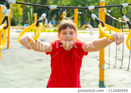 Young girl on playground 112680980