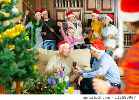 Happy big family is meeting for celebration New Year together at home Happy big family is meeting for celebration New Year together at home 112680987