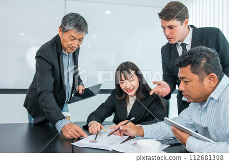Business people  team work while working in board room, design project, discussing ideas,discuss financial statistics together teamwork concept 112681398