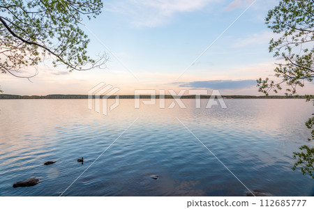 Blue lake with cloudy sky, natural background Blue lake with cloudy sky, natural background 112685777