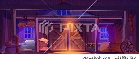 Farm barn inside with wood walls and gate at night 112686429