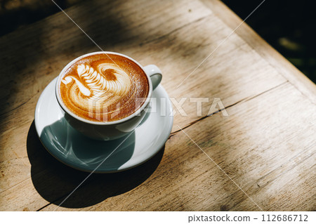 latte art coffee in white cup latte art coffee in white cup 112686712