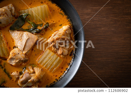 Chicken curry soup with roti Chicken curry soup with roti 112686902
