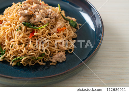 stir-fried instant noodles with basil and minced pork stir-fried instant noodles with basil and minced pork 112686931