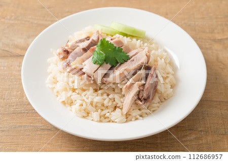 Hainanese Chicken Rice or steamed rice with chicken Hainanese Chicken Rice or steamed rice with chicken 112686957