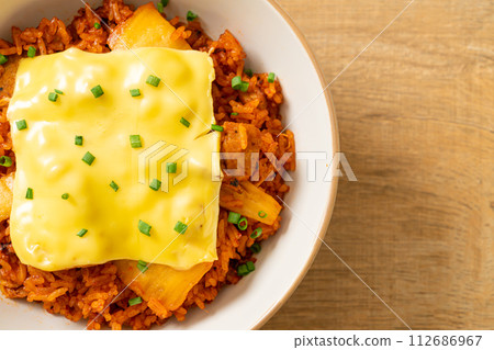 kimchi fried rice with pork and topped cheese 112686967