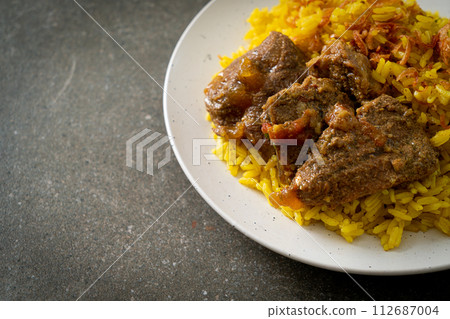 Beef Biryani or Curried rice and beef - Thai-Muslim version of Indian biryani, with fragrant yellow rice and beef 112687004