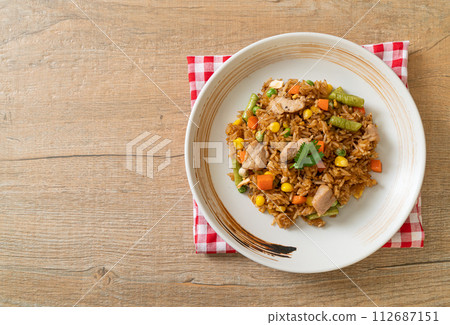 pork fried rice on white plate pork fried rice on white plate 112687151