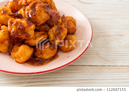 fried meatballs with spicy dipping sauce fried meatballs with spicy dipping sauce 112687155