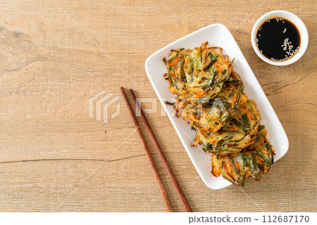 Pajeon or Korean pancake or Korean pizza 112687170