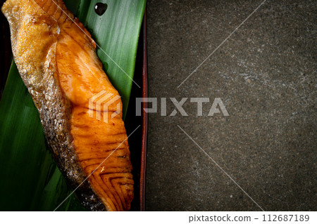 Grilled Salmon Steak with Soy Sauce 112687189