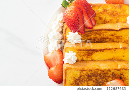 french toast with fresh strawberry and whipping cream 112687683