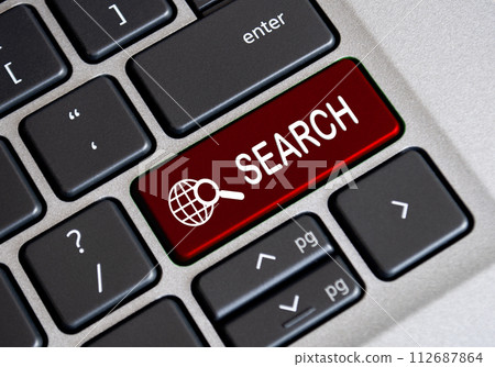 Search word on red keyboard button. Searching or talent search concept Search word on red keyboard button. Searching or talent search concept 112687864