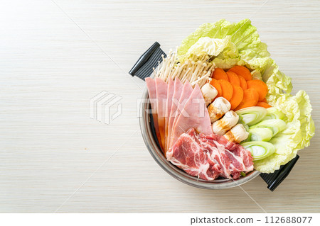 sukiyaki or shabu hot pot black soup with meat raw and vegetable 112688077