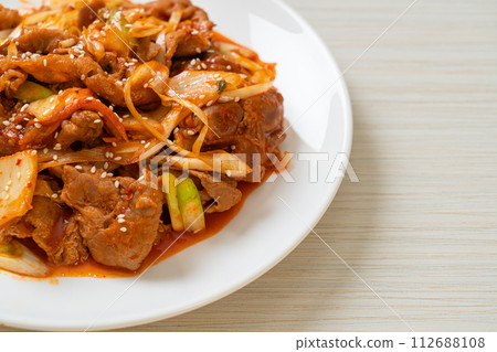 stir-fried pork with Korean spicy paste and kimchi 112688108