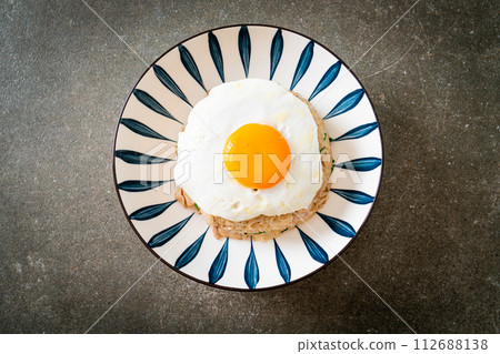 fried rice with pork and fried egg in Japanese style fried rice with pork and fried egg in Japanese style 112688138