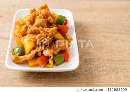 Stir fried sweet and sour sauce with pork Stir fried sweet and sour sauce with pork 112688309