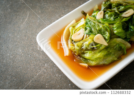 Stir fried Iceberg lettuce with Oyster sauce Stir fried Iceberg lettuce with Oyster sauce 112688332
