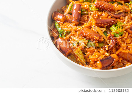 Stir-fried squid or octopus with Korean spicy sauce rice bowl Stir-fried squid or octopus with Korean spicy sauce rice bowl 112688383