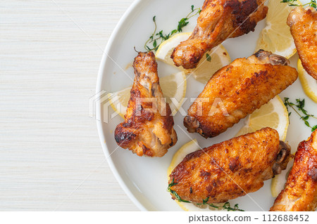 fried lemon pepper chicken wings 112688452