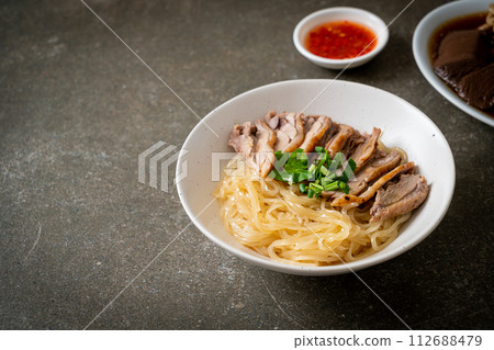 dried duck noodles in white bowl dried duck noodles in white bowl 112688479