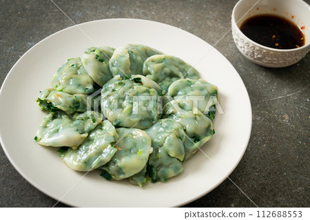 steamed chives dumplings with sauce steamed chives dumplings with sauce 112688553