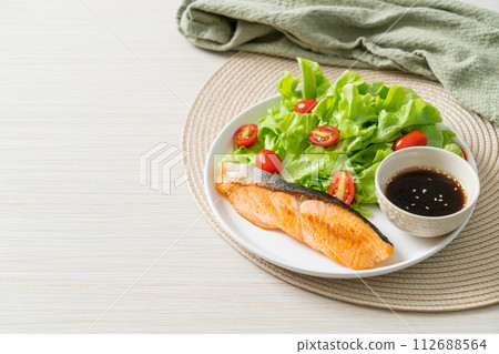grilled salmon fillet steak with salad grilled salmon fillet steak with salad 112688564