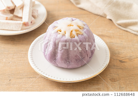 taro bun with white sugar cream and nut taro bun with white sugar cream and nut 112688648