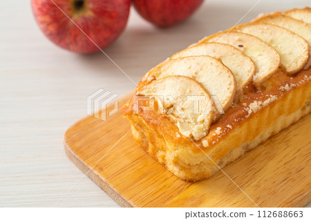 apple loaf crumbled on wood board apple loaf crumbled on wood board 112688663