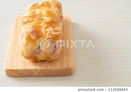 taro toast bread on wood board taro toast bread on wood board 112688665