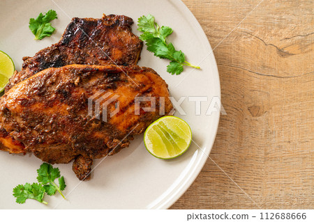 spicy grilled jamaican jerk chicken spicy grilled jamaican jerk chicken 112688666