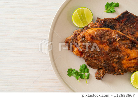 spicy grilled jamaican jerk chicken spicy grilled jamaican jerk chicken 112688667