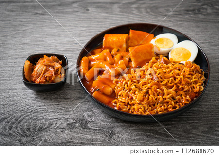 Korean instant noodles with Korean rice cake and fish cake and boiled egg 112688670