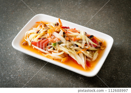 Som Tum - Spicy papaya salad Som Tum - Spicy papaya salad 112688997