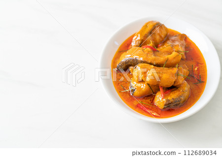 Redtail Catfish Fish in Dried Red Curry Sauce that called Choo Chee Redtail Catfish Fish in Dried Red Curry Sauce that called Choo Chee 112689034