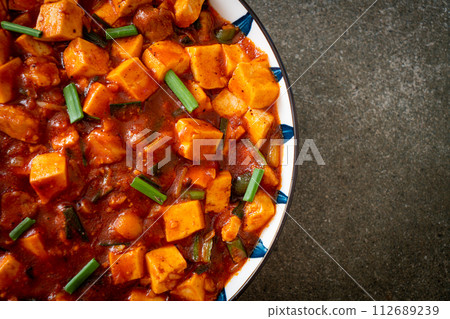 Mapo Tofu - The traditional Sichuan dish of silken tofu and ground beef, packed with mala flavor from chili oil and Sichuan peppercorns. 112689239