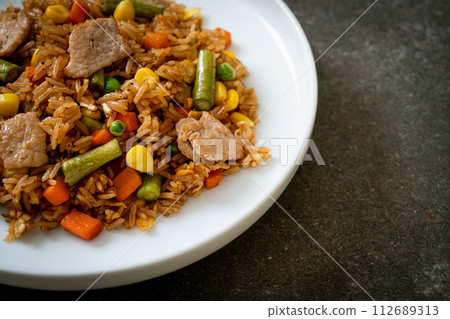 pork fried rice on white plate pork fried rice on white plate 112689313
