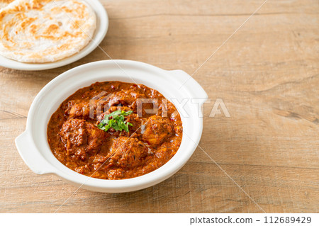 chicken tikka masala spicy curry meat food with roti or naan bread chicken tikka masala spicy curry meat food with roti or naan bread 112689429