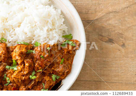 chicken tikka masala with rice on plate chicken tikka masala with rice on plate 112689433
