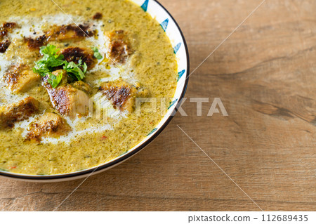 Afghani chicken in green curry or Hariyali tikka chicken hara masala 112689435