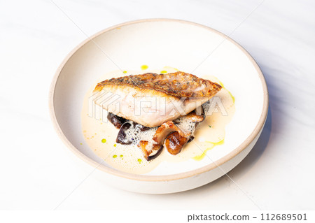 grilled Barramundi steak with mushroom sauce grilled Barramundi steak with mushroom sauce 112689501