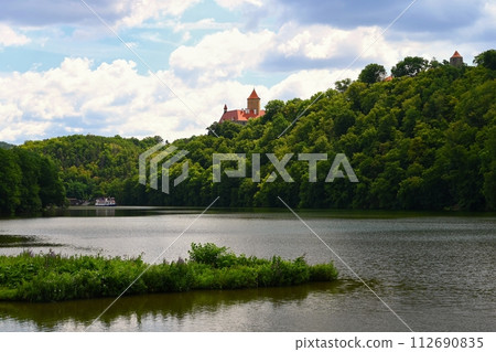 Beautiful Gothic castle Veveri. The city of Brno at the Brno dam. South Moravia - Czech Republic - Central Europe. Spring landscape. Beautiful Gothic castle Veveri. The city of Brno at the Brno dam. South Moravia - Czech Republic - Central Europe. Spring landscape. 112690835