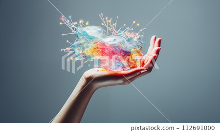 Energetic hand holds vibrant abstract colors, sparking imaginative ideas 112691000