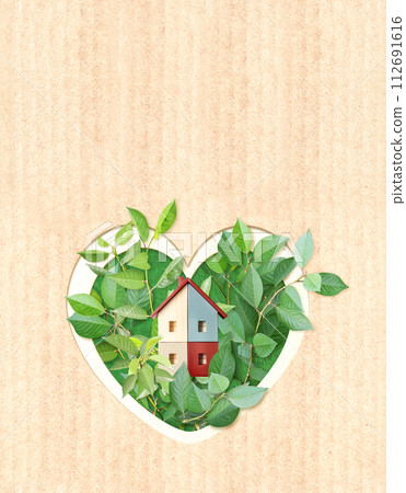 Eco friendly house. Wooden home model, heart shape hole and green leaves on cardboard texture. Ecology, go green, Green Energy, Renewable Power, environmental and conservation protection concept Eco friendly house. Wooden home model, heart shape hole and green leaves on cardboard texture. Ecology, go green, Green Energy, Renewable Power, environmental and conservation protection concept 112691616