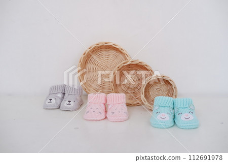 cute baby crochet shoes as a background 112691978