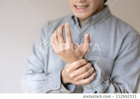 Man with wrist pain Tendonitis Sprain Body parts 112692331
