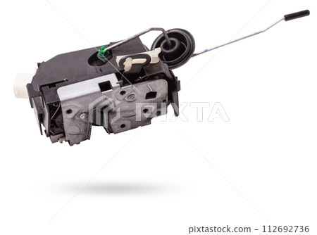 Detail of a car spare part made of black plastic and metal - door lock separately isolated on a white background. Repair in a car workshop, equipment for sale. 112692736