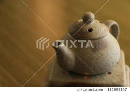 cute incense burner on the table 112693137